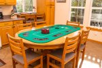 Enjoy a friendly game of poker on the fold out table stored upstairs